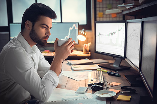  Crude oil trader at desk